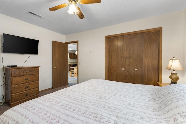 310 Turtle Cove Ln, Reeds Spring, MO 65737 - carpeted bedroom with a closet and ceiling fan