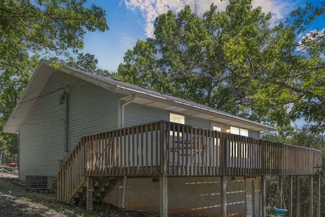 310 Turtle Cove Ln, Reeds Spring, MO 65737 - view of side of home featuring a wooden deck and a central air condition unit