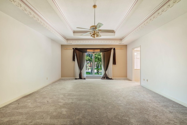 2347 E Nottingham St, Springfield, MO 65804 - carpeted empty room with a raised ceiling, a ceiling fan, and crown molding