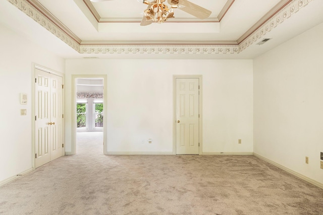 2347 E Nottingham St, Springfield, MO 65804 - spare room with carpet flooring, a raised ceiling, and crown molding