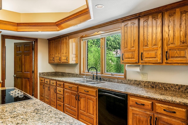 2347 E Nottingham St, Springfield, MO 65804 - kitchen with black appliances, brown cabinets, and light stone countertops