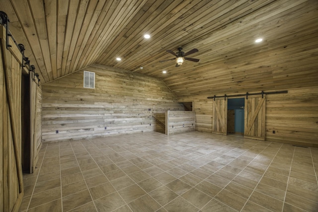 12132 W Farm Road 18, Walnut Grove, MO 65770 - additional living space featuring a barn door, wood walls, vaulted ceiling, ceiling fan, and recessed lighting
