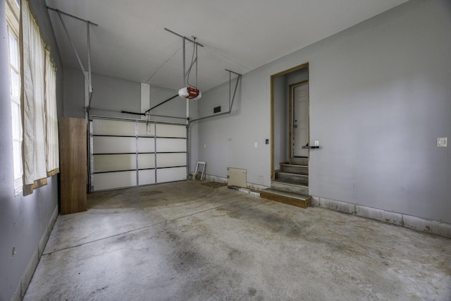 12132 W Farm Road 18, Walnut Grove, MO 65770 - garage featuring a garage door opener