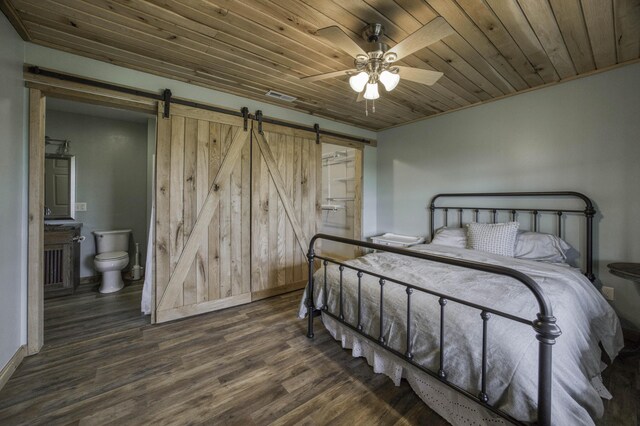 12132 W Farm Road 18, Walnut Grove, MO 65770 - bedroom with a barn door, wooden ceiling, wood finished floors, connected bathroom, and ceiling fan