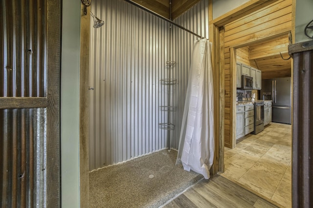 12132 W Farm Road 18, Walnut Grove, MO 65770 - bathroom featuring a shower with curtain