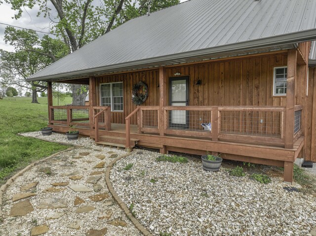 12132 W Farm Road 18, Walnut Grove, MO 65770 - view of front of property featuring covered porch, a metal roof, and a front lawn