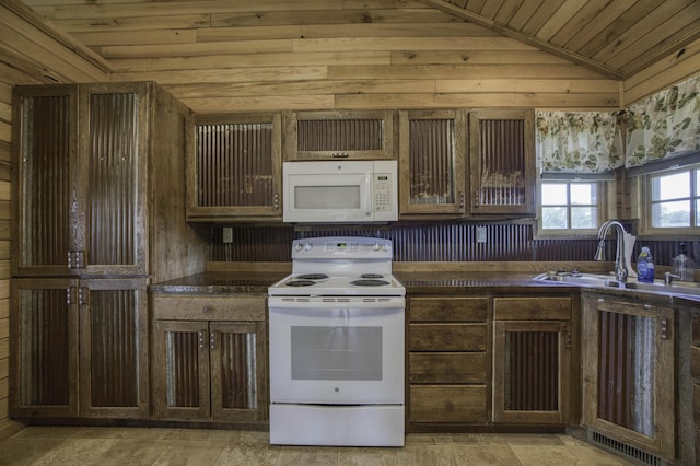 12132 W Farm Road 18, Walnut Grove, MO 65770 - kitchen featuring white appliances, wooden ceiling, dark countertops, wooden walls, and vaulted ceiling