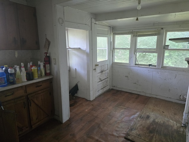510 W 4th St, Willow Springs, MO 65793 - kitchen featuring wood finished floors, light countertops, and brown cabinets