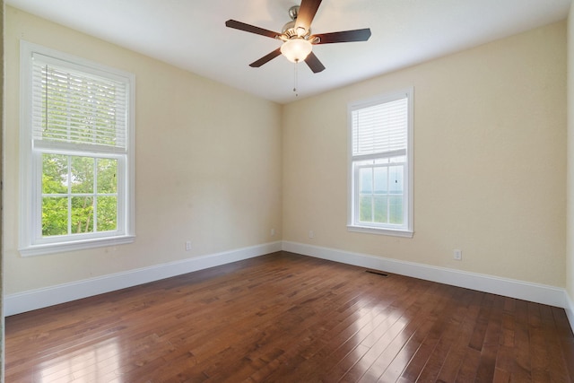 358 Spring View Pl, Reeds Spring, MO 65737 - unfurnished room with healthy amount of natural light, dark wood finished floors, and ceiling fan
