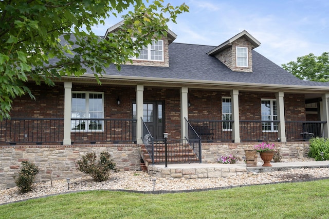 358 Spring View Pl, Reeds Spring, MO 65737 - view of front of home with brick siding, roof with shingles, and a porch