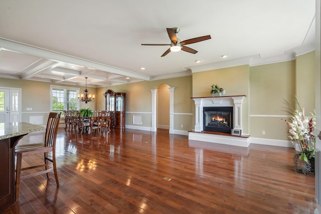358 Spring View Pl, Reeds Spring, MO 65737 - living area featuring hardwood / wood-style flooring, ceiling fan, a glass covered fireplace, coffered ceiling, and beam ceiling