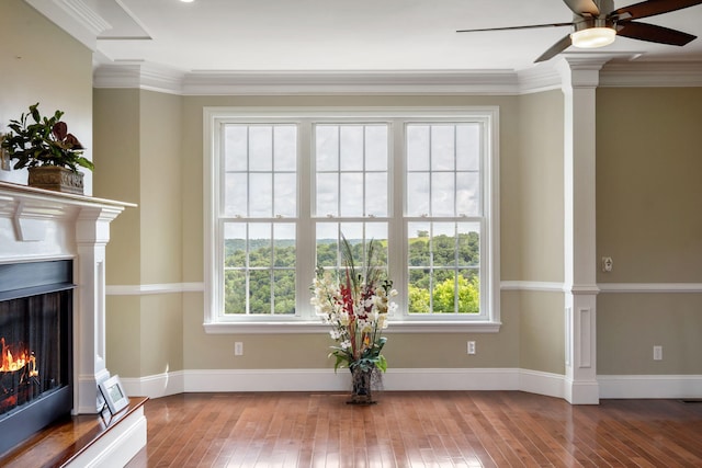 358 Spring View Pl, Reeds Spring, MO 65737 - living room with hardwood / wood-style flooring, ceiling fan, healthy amount of natural light, and crown molding