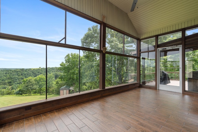 358 Spring View Pl, Reeds Spring, MO 65737 - unfurnished sunroom featuring lofted ceiling, ceiling fan, and a view of trees