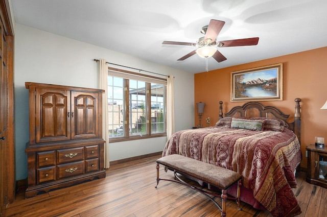 3141 E Raynell St Unit D, Springfield, MO 65804 - bedroom with wood finished floors and a ceiling fan