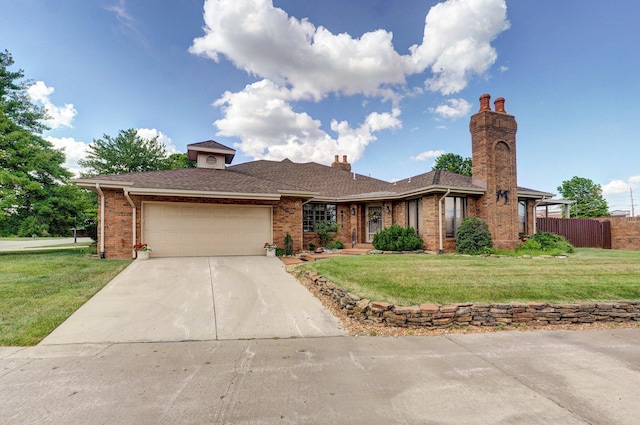 3141 E Raynell St Unit D, Springfield, MO 65804 - view of front of home featuring a garage, concrete driveway, brick siding, a chimney, and a shingled roof