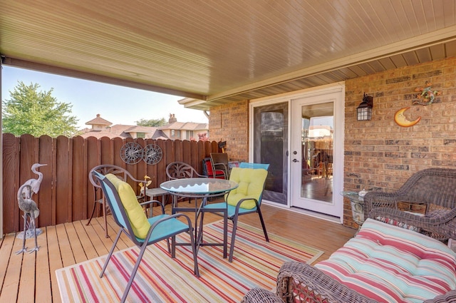 3141 E Raynell St Unit D, Springfield, MO 65804 - wooden deck featuring outdoor dining space