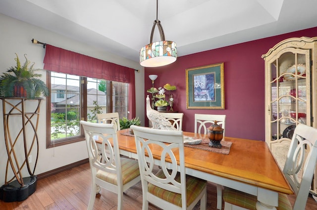 3141 E Raynell St Unit D, Springfield, MO 65804 - dining room featuring hardwood / wood-style flooring and baseboards