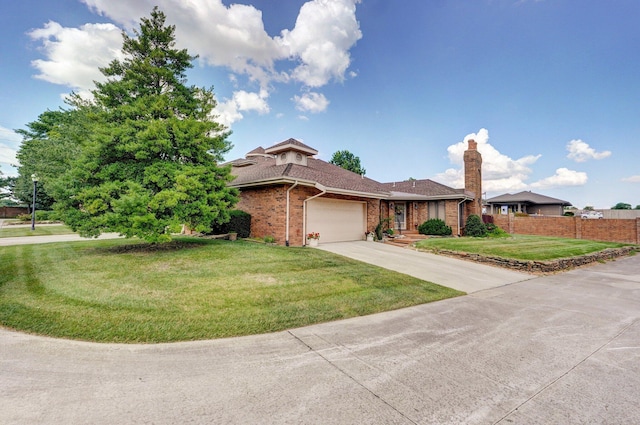 3141 E Raynell St Unit D, Springfield, MO 65804 - view of front of property with an attached garage, brick siding, concrete driveway, and roof with shingles