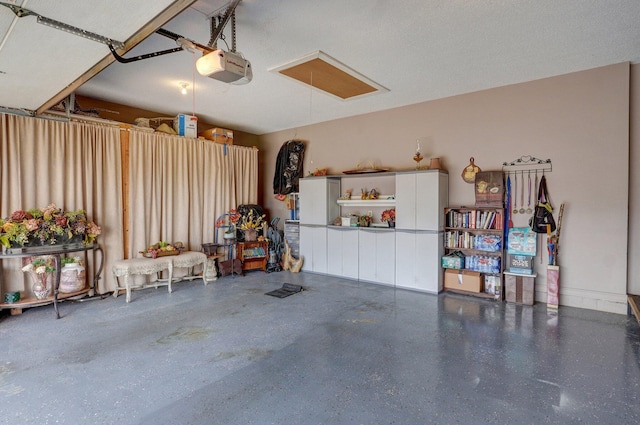 3141 E Raynell St Unit D, Springfield, MO 65804 - garage featuring a garage door opener