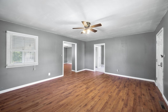 407 N Pine St, Pierce City, MO 65723 - empty room featuring a ceiling fan and wood finished floors