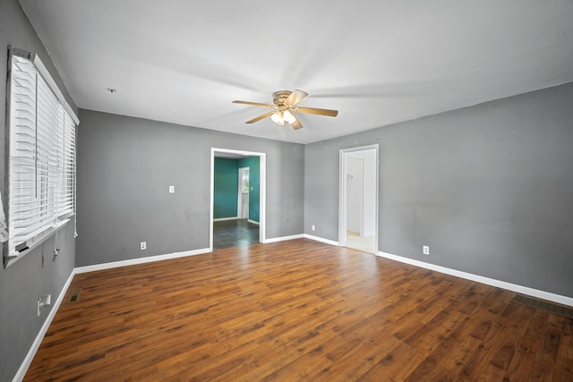407 N Pine St, Pierce City, MO 65723 - empty room with ceiling fan and wood finished floors