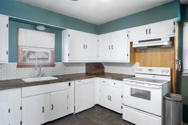407 N Pine St, Pierce City, MO 65723 - kitchen with white appliances, extractor fan, dark countertops, and decorative backsplash
