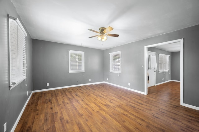 407 N Pine St, Pierce City, MO 65723 - empty room with a ceiling fan and wood finished floors