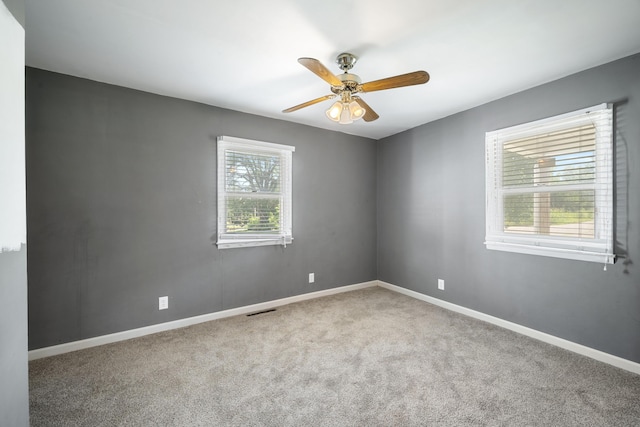 407 N Pine St, Pierce City, MO 65723 - unfurnished room featuring a ceiling fan and carpet