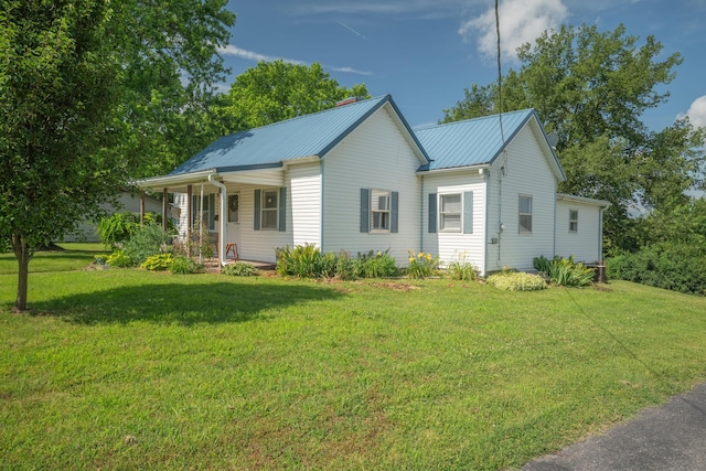 407 N Pine St, Pierce City, MO 65723 - ranch-style house featuring a front lawn, a porch, and a metal roof