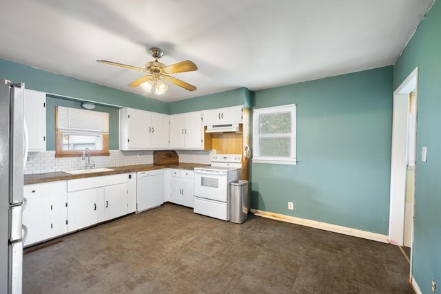 407 N Pine St, Pierce City, MO 65723 - kitchen featuring white appliances, under cabinet range hood, tasteful backsplash, and a ceiling fan