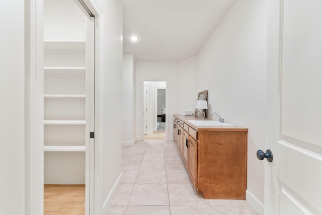 1303 E Eaglegate Pkwy, Springfield, MO 65804 - hall with a sink and light tile patterned floors