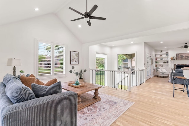1303 E Eaglegate Pkwy, Springfield, MO 65804 - living room with a ceiling fan, light wood-style floors, high vaulted ceiling, and recessed lighting