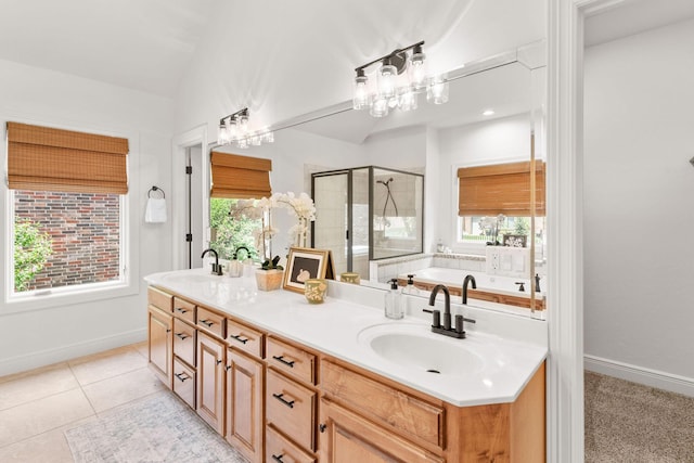 1303 E Eaglegate Pkwy, Springfield, MO 65804 - bathroom with a stall shower, a garden tub, double vanity, and tile patterned floors