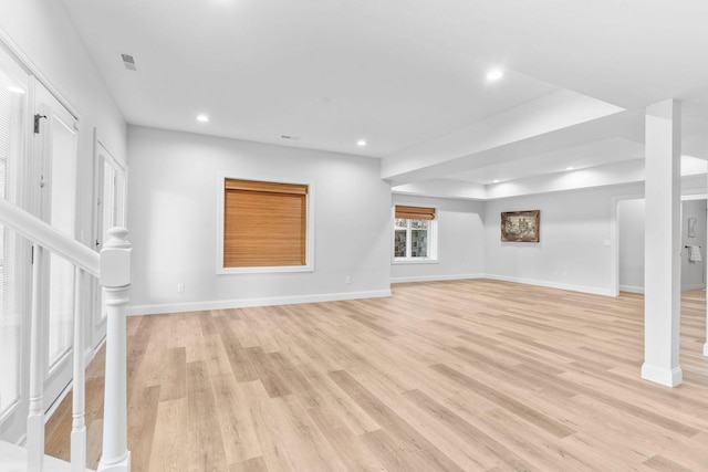 1303 E Eaglegate Pkwy, Springfield, MO 65804 - below grade area featuring light wood finished floors and recessed lighting