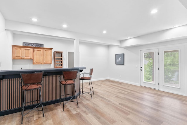 1303 E Eaglegate Pkwy, Springfield, MO 65804 - indoor wet bar with light wood-style floors and recessed lighting