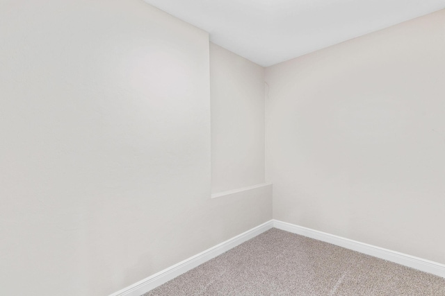 1303 E Eaglegate Pkwy, Springfield, MO 65804 - carpeted spare room featuring baseboards