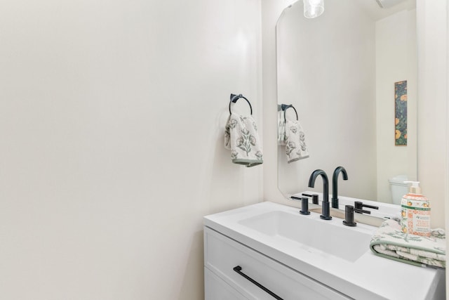 1303 E Eaglegate Pkwy, Springfield, MO 65804 - bathroom featuring vanity and toilet