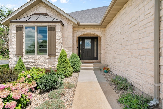 1303 E Eaglegate Pkwy, Springfield, MO 65804 - view of exterior entry featuring roof with shingles and stone siding