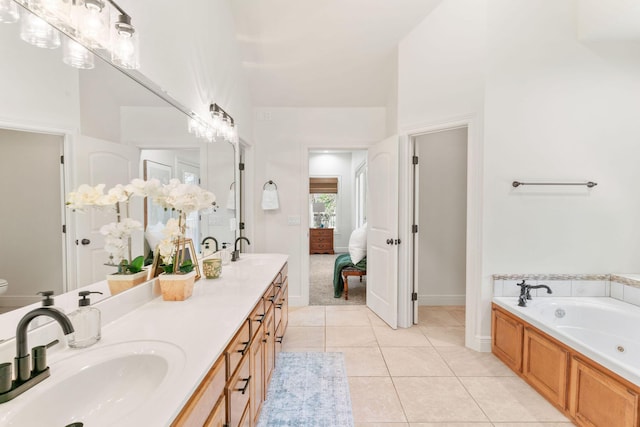 1303 E Eaglegate Pkwy, Springfield, MO 65804 - full bathroom featuring double vanity, a bath, ensuite bathroom, and tile patterned flooring