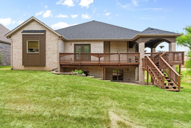 1303 E Eaglegate Pkwy, Springfield, MO 65804 - back of property with brick siding, a deck, a shingled roof, and a yard