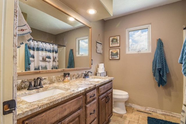 10626 W State Highway 76, Cape Fair, MO 65624 - bathroom with double vanity, healthy amount of natural light, and a shower with shower curtain