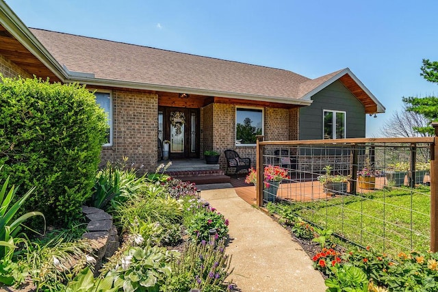 10626 W State Highway 76, Cape Fair, MO 65624 - view of front of house with brick siding and roof with shingles