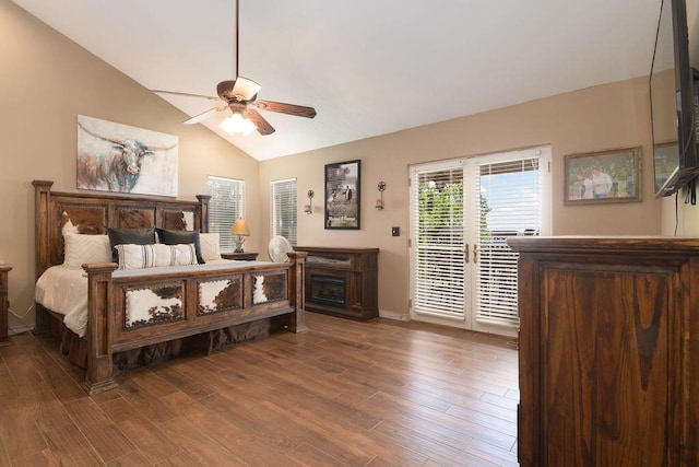 10626 W State Highway 76, Cape Fair, MO 65624 - bedroom with access to outside, dark wood finished floors, a ceiling fan, a fireplace, and high vaulted ceiling