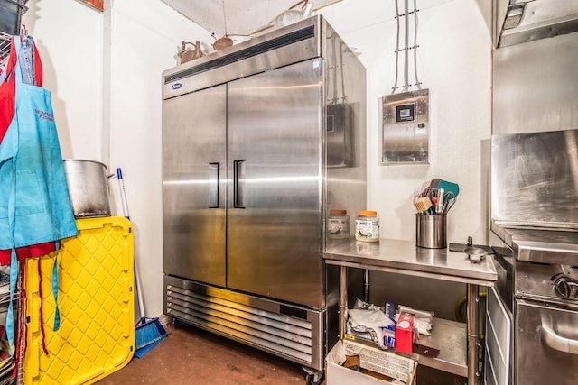 10626 W State Highway 76, Cape Fair, MO 65624 - kitchen featuring built in refrigerator, concrete floors, and stainless steel countertops