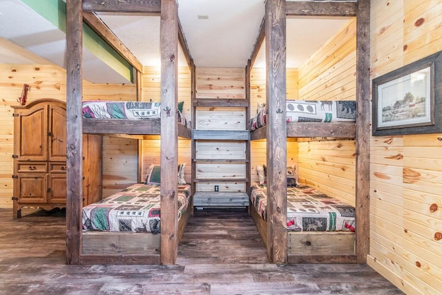 10626 W State Highway 76, Cape Fair, MO 65624 - bedroom featuring wood walls and wood finished floors