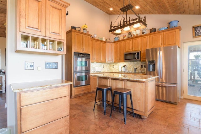 10626 W State Highway 76, Cape Fair, MO 65624 - kitchen with appliances with stainless steel finishes, wood ceiling, light stone countertops, tasteful backsplash, and a kitchen island