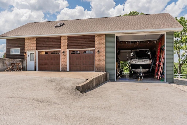 10626 W State Highway 76, Cape Fair, MO 65624 - garage with asphalt driveway