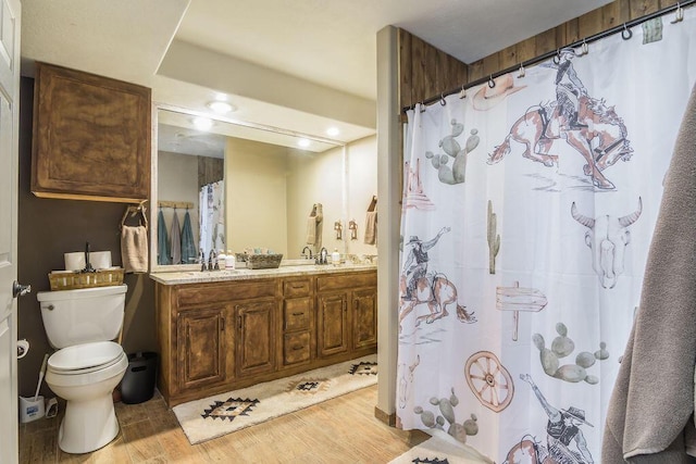10626 W State Highway 76, Cape Fair, MO 65624 - full bathroom featuring wood finished floors, double vanity, recessed lighting, and curtained shower