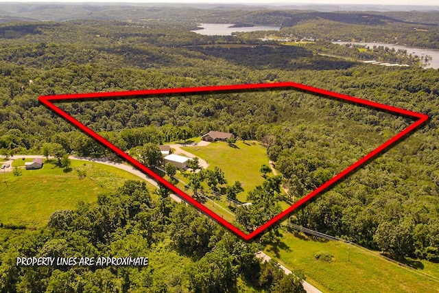 10626 W State Highway 76, Cape Fair, MO 65624 - aerial overview of property's location with a forest and property boundaries highlighted
