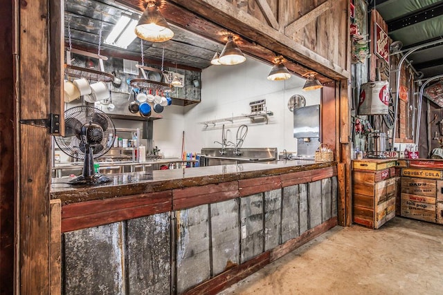 10626 W State Highway 76, Cape Fair, MO 65624 - kitchen featuring unfinished concrete floors